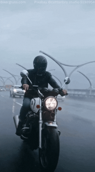 Motorradfahrer in einer Gif Animation, der im Regen über eine Autobahn-Brücke fährt